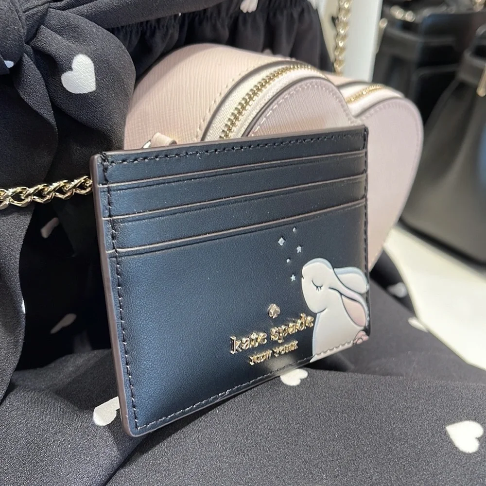 Kate Spade Bunbun Bunny Small Slim Card Holder Wallet

COLOR:
Black Multi
NWT - Picture 8 of 16